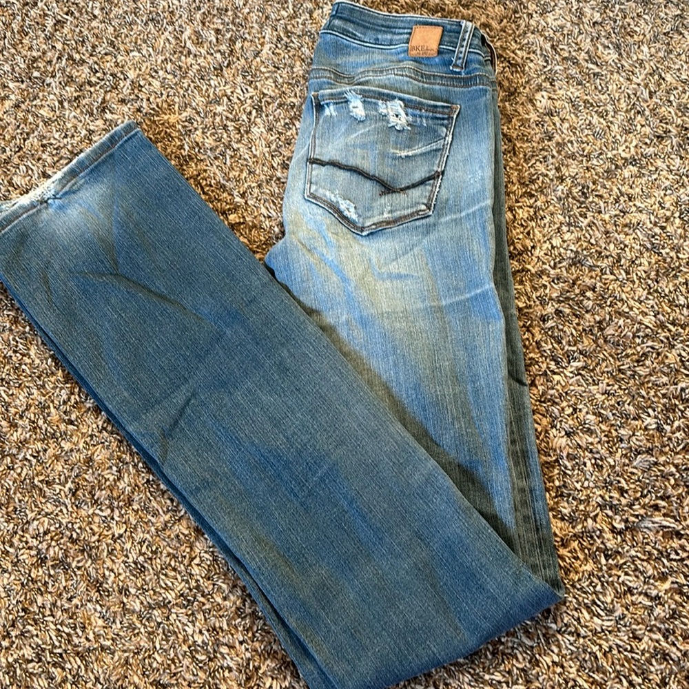 Buckle boot cut jeans